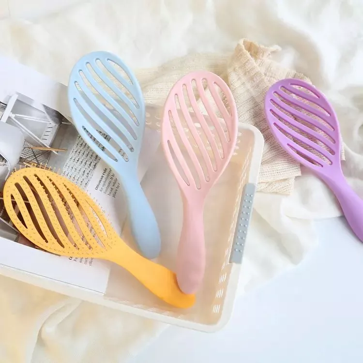 Brosse à cheveux ronde en plastique